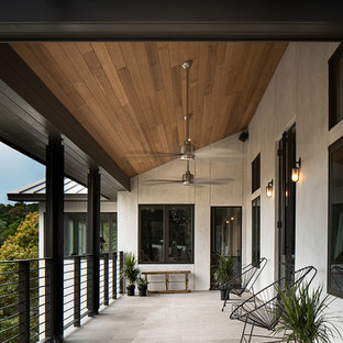 Balcony - contemporary balcony idea in Austin with a roof extension