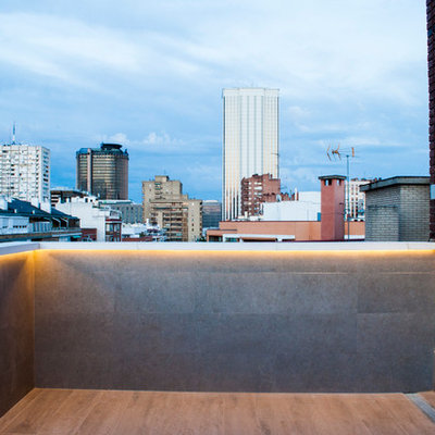 Balcony - mid-sized contemporary balcony idea in Madrid with no cover