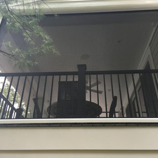 Balcony - mid-sized contemporary privacy balcony idea in New York with no cover