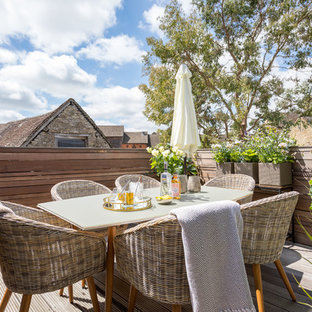 Inspiration for a medium sized country balcony in Gloucestershire with a potted garden.