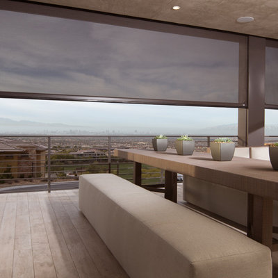 Large trendy balcony photo in Sacramento with a roof extension