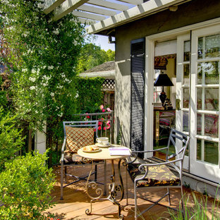 Inspiration for a mid-sized timeless privacy balcony remodel in San Francisco with a pergola