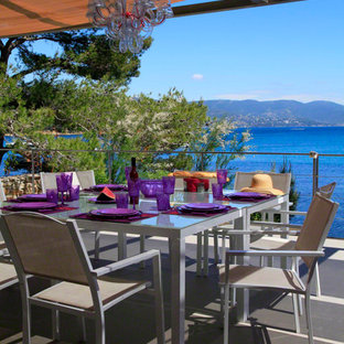Inspiration pour un grand balcon marin avec un auvent.