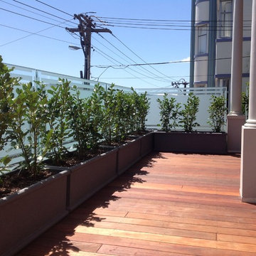 Balcony deck over garage after; looking North