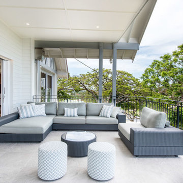Sophisticated outdoor living area with custom made poufs
