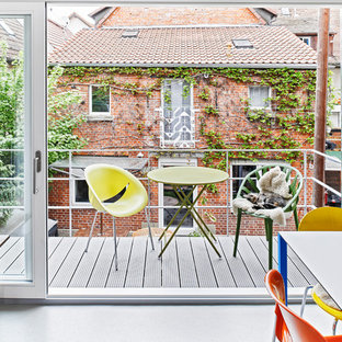 Ispirazione per un balcone eclettico di medie dimensioni