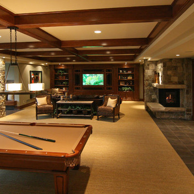 Elegant multicolored floor basement photo in Minneapolis with a standard fireplace