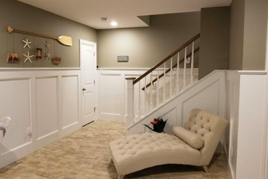 Basement - transitional underground brick floor and beige floor basement idea with multicolored walls