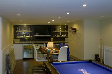 This is an example of a large contemporary basement in Manchester.