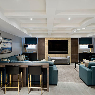 Basement - large traditional look-out light wood floor and brown floor basement idea in Toronto with gray walls