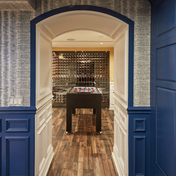 Arched Opening into Foosball Room with Wine Cellar Beyond