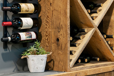 Inspiration for a large rustic porcelain tile and gray floor wine cellar remodel in Ottawa