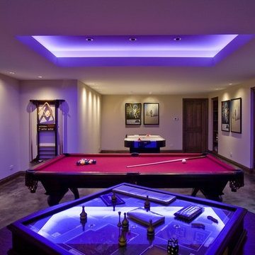 Basement Game Room with Stained Concrete Floor and Fluorescent Indirect Lighting
