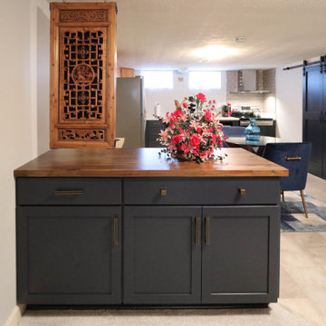 Basement Kitchen with Medallion Blue Cabinets with matching Barn Door