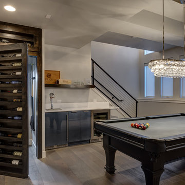 Basement Pool Table and Hidden Bookcase Wine Rack