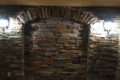 Basement remodel with stone accents
