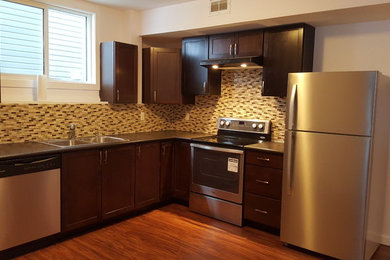 Example of a mid-sized kitchen design in Toronto