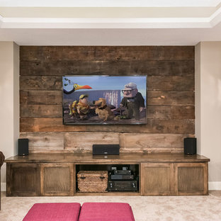 Mid-sized mountain style walk-out medium tone wood floor and brown floor basement photo in Minneapolis with beige walls, a two-sided fireplace and a stone fireplace