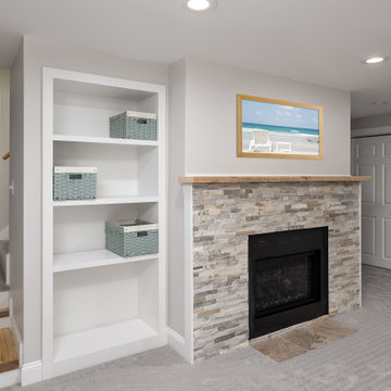 Basement with fireplace and built in storage
