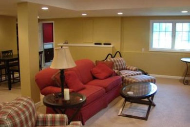 Basement - large look-out carpeted basement idea in Detroit with yellow walls