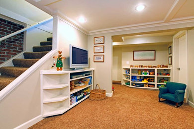 Large elegant underground carpeted and beige floor basement game room photo in Portland with white walls and no fireplace