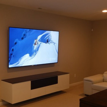 Carmel, IN - 85" Mounted TV Panel, Floating Furniture, Hidden Surround Sound