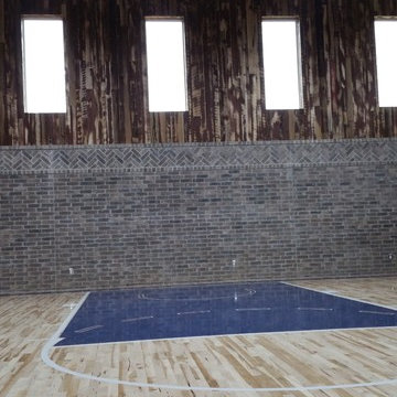 Cernicky basement w/ half basketball court; golf simulater room; bar; half bath