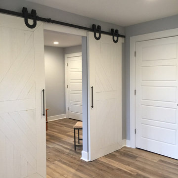 Transitional Whole Basement Makeover in Fry's Spring Neighborhood