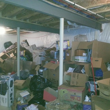 Debris removal in basement before shot