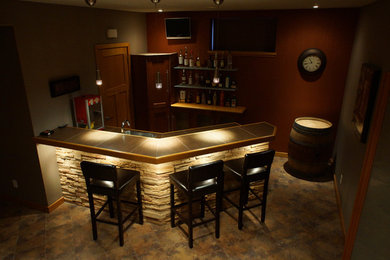 Example of an arts and crafts basement design in Calgary