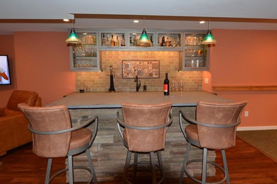 Inspiration for a contemporary basement remodel in Philadelphia with orange walls