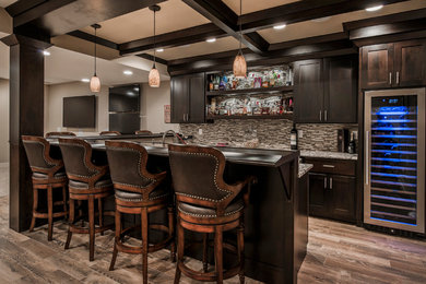 Example of a transitional home bar design in Columbus