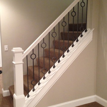 Finished Basement Stairwell Iron Balusters