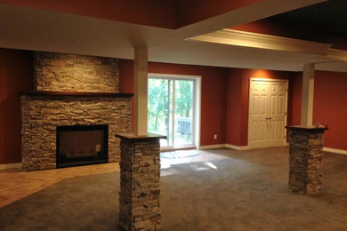 Example of an arts and crafts basement design in Baltimore