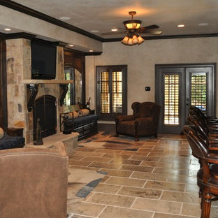 Inspiration for a mediterranean beige floor basement remodel in Atlanta