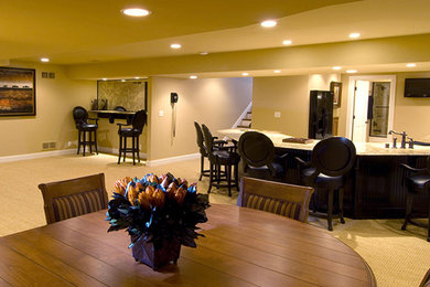 Basement - large traditional look-out carpeted and yellow floor basement idea in Louisville with beige walls