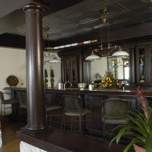 Mahogany Wet Bar with Tin Ceiling, Copper Countertop and Stained Concrete Floors