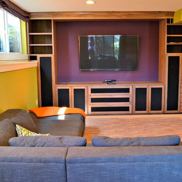 Media space: colorful walls, built-in storage, big screen TV - check!