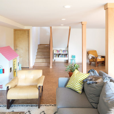 Basement - mid-sized 1960s walk-out cork floor and brown floor basement idea in Seattle with white walls