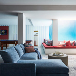 Large contemporary fully buried basement in Sydney with white walls, carpet, no fireplace and beige floor.