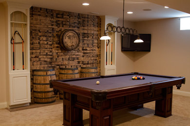Basement - mid-sized traditional underground carpeted basement idea in Columbus with beige walls