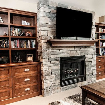 Stone fireplace with cherry wall units