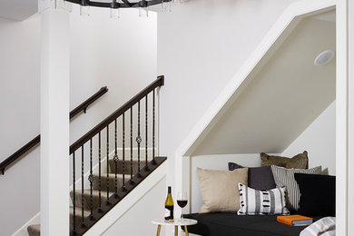 Photo of a large traditional walk-out basement in Minneapolis with grey walls, vinyl flooring and grey floors.