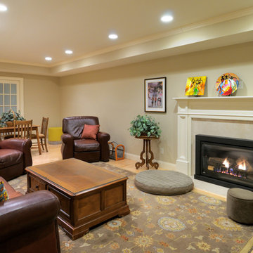 Traditional Basement Remodel with tray ceiling, engineered hardwood flooring, ga