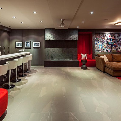 Inspiration for a contemporary underground ceramic tile and gray floor basement remodel in Toronto with gray walls and no fireplace