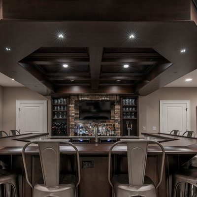 Inspiration for a transitional basement remodel in Columbus with beige walls
