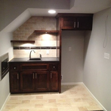 Wet bar for a limited amount of space tucked under a staitcase