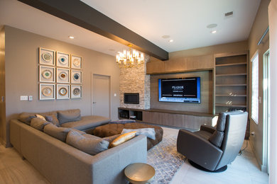 Large minimalist walk-out white floor basement photo in Other with beige walls, a ribbon fireplace and a stone fireplace