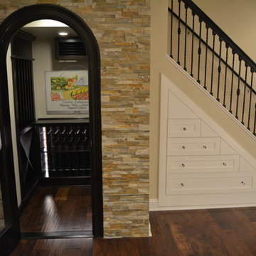 Wine room and drawers under the stairs
