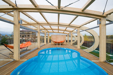 Источник вдохновения для домашнего уюта: бассейн произвольной формы в современном стиле